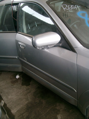 ASUBARU LEGACY Door Mirror Here in Great Condition.Call us for your SUBARU Parts and Bits!